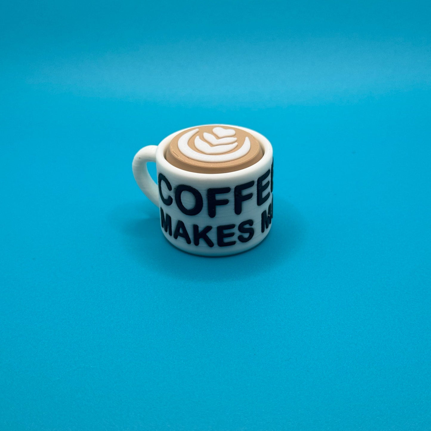 Coffee mug clicker on a blue background