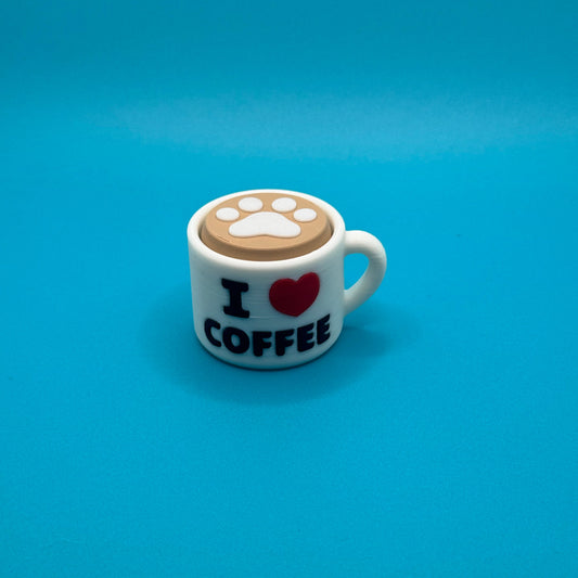 Coffee mug clicker on a blue background