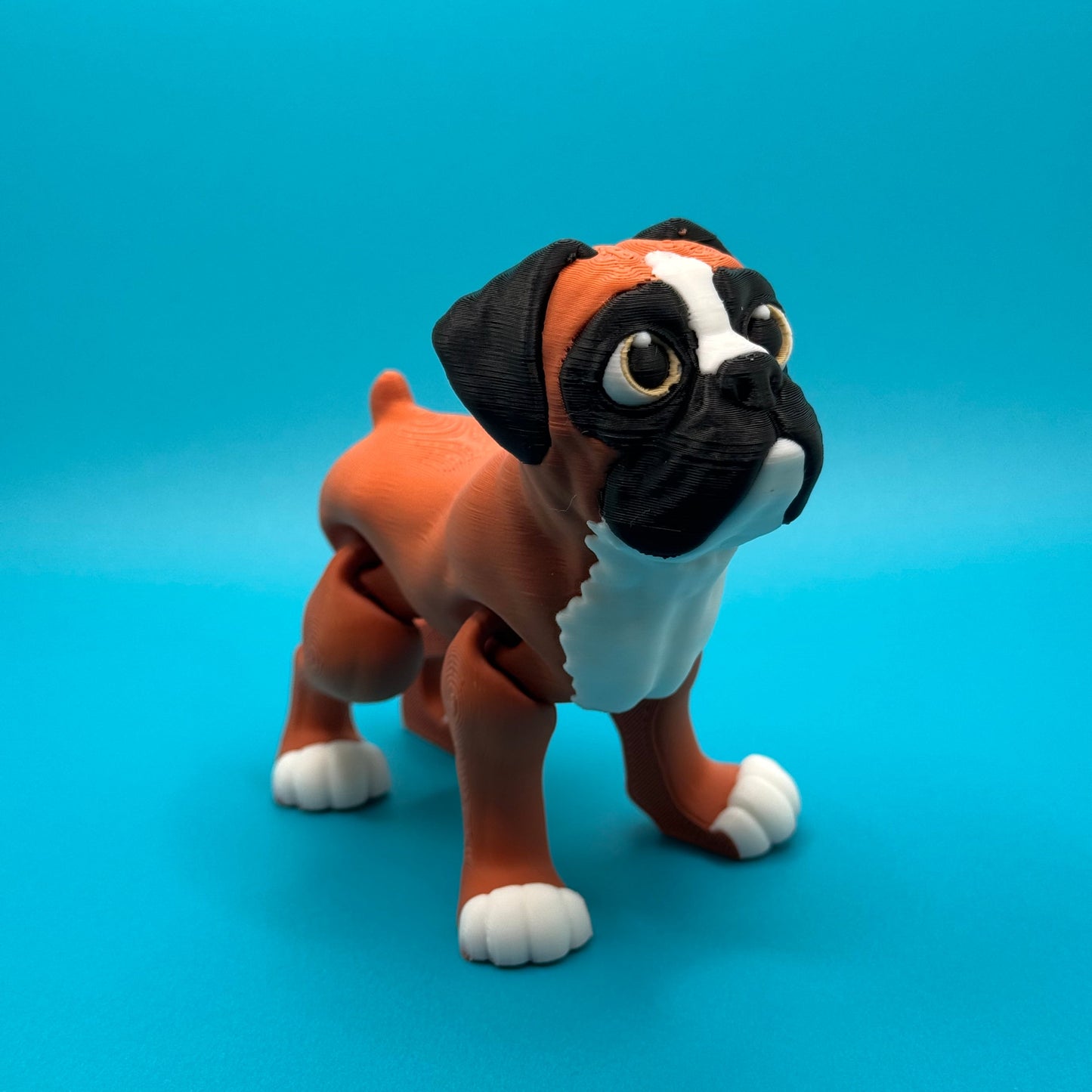 Dog figurine on a blue background