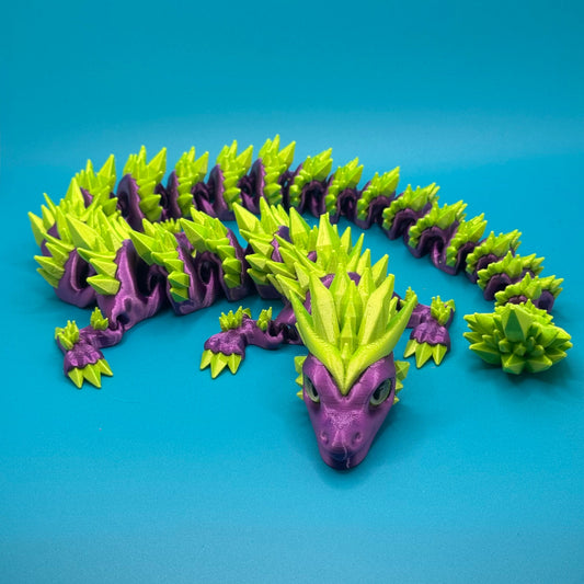 Dragon figurine on a blue background